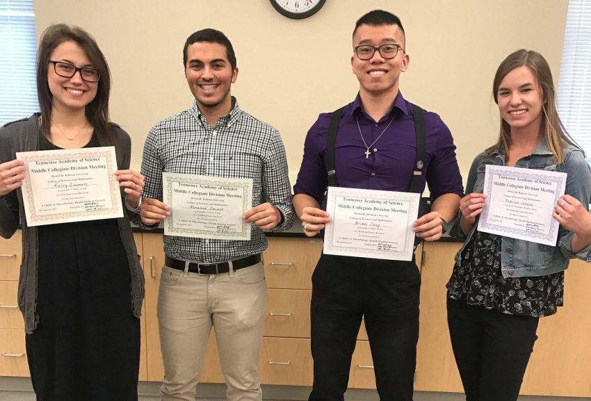 Students pose with their awards after the TAS Awards