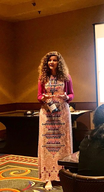 Finch Represents Belmont at Symposium
