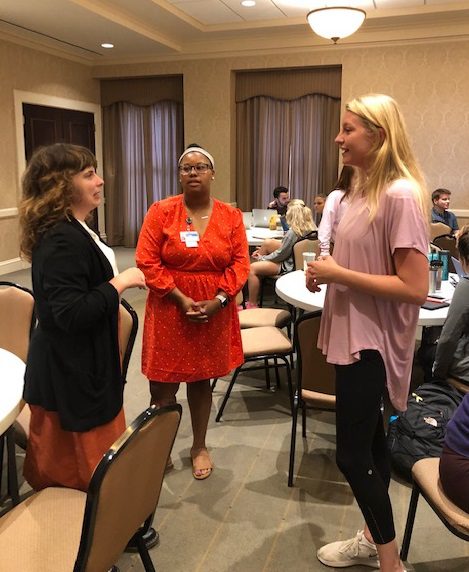 Caine and Malick speak with nursing students and faculty about the residency program.