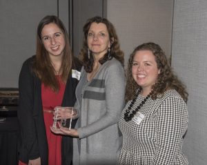 Members of the College of Occupational Therapy holding their award