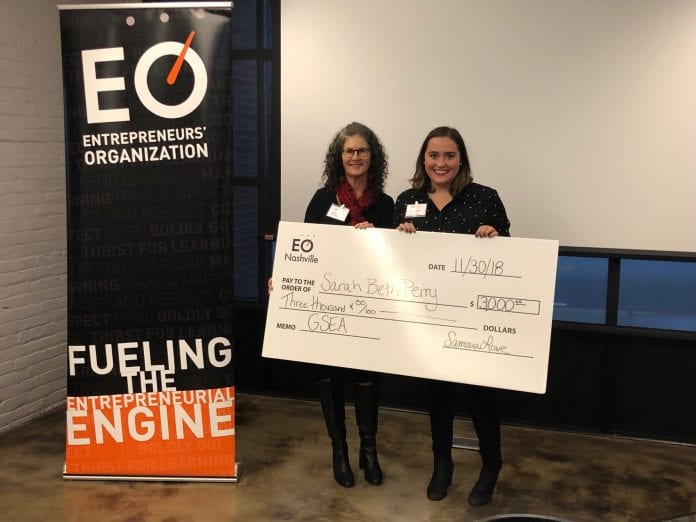 Sarah Beth Perry presented check for winning competition.
