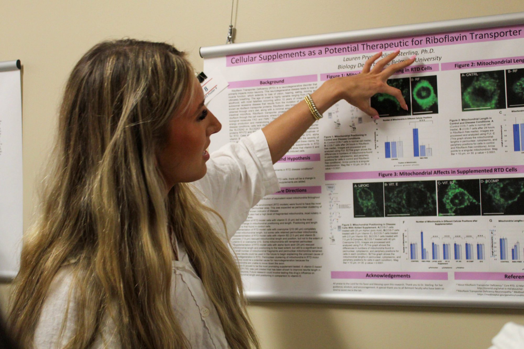 Student presenting poster