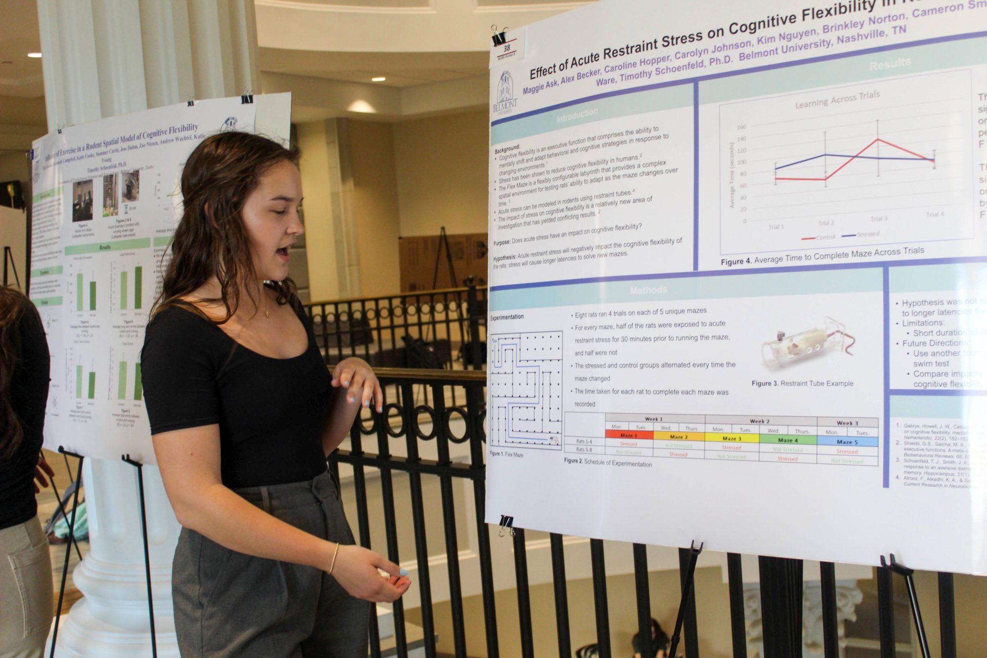 Student presenting poster