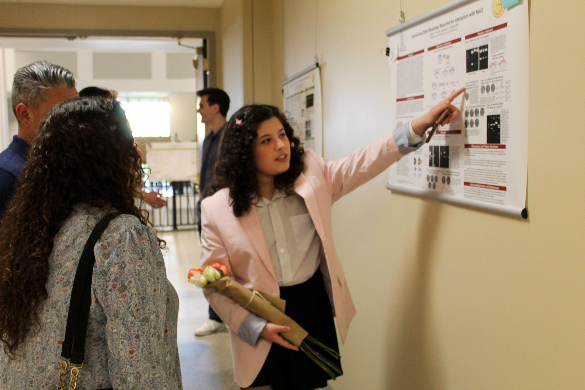 Student presenting poster
