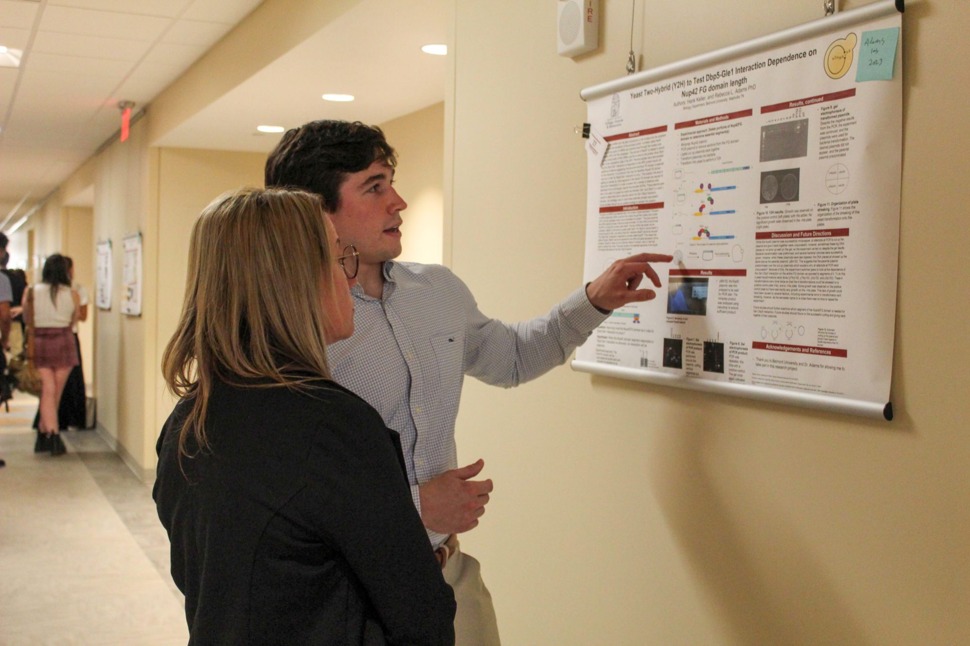 Student presenting poster